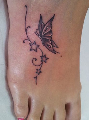farfalla piede tattoo