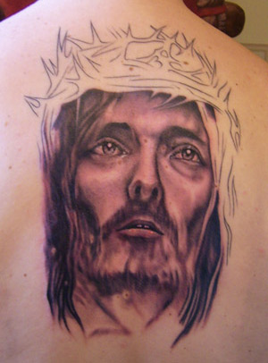 Tatuaggio del volto di Cristo