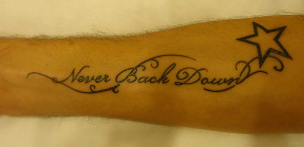 Tatuaggio scritta braccio