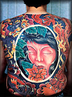 Tatuaggio di un Viso di donna sulla schiena